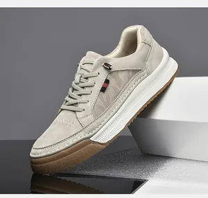 Detail of premium suede men's sneaker showing mesh texture and tricolor strap accents