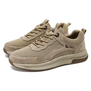 Detail of breathable khaki mesh and suede panels on men outdoor casual sneakers