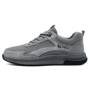 Macro detail of breathable grey mesh and suede stitching on men's casual sneakers