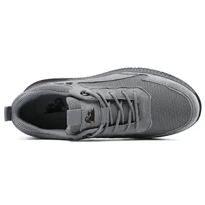 Top view of men's grey breathable leather and mesh sneakers with precise stitching detail