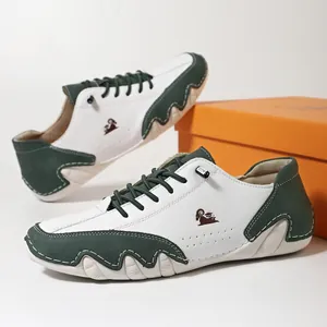 Men's fashion casual sneakers in white and green leather with unique wavy outsole design
