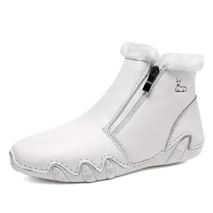 White leather ankle boots with warm plush lining and side zipper for winter outdoor wear