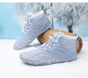 Detail of light blue winter boots with warm plush lining and non-slip rubber outsoles