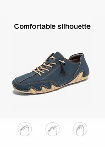 Macro shot of navy blue suede boat shoes with contrasting stitching and protective toe