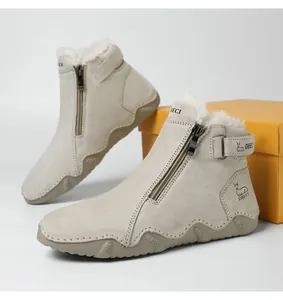 Detail of warm winter boots featuring faux shearling lining and decorative side buckle