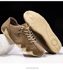 Detailed view of brown casual boat shoes with anti-slip rubber soles and lace-up closure