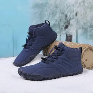 Detailed view of blue winter snow boots with warm faux fur lining and anti-slip rubber soles