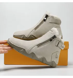 Detail view of leather winter boots showing warm plush lining and durable rubber sole