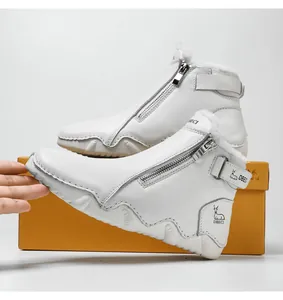 Detail of white leather boots featuring a side zipper and warm fleece lining for winter