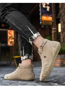Street style view of men high-top sneakers with wavy soles and ankle strap detail