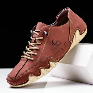 Men's brown casual boat shoes with wave-patterned thick rubber soles and lace-up design