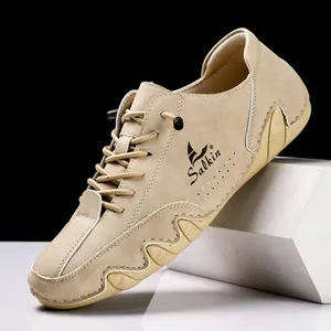 Men's khaki suede boat shoes with Salkin logo and non-slip rubber soles for outdoor