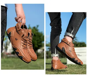 Brown leather high-top outdoor boots featuring a unique jagged rubber sole and Velcro straps