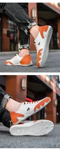Détails de baskets décontractées bicolores orange avec semelles en caoutchouc antidérapantes