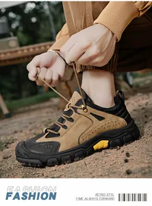 Dettaglio scarpa da trekking in pelle kaki con punta rinforzata e suola carrarmato