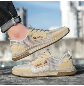 Close-up of khaki breathable mesh sneakers with durable rubber sole and DBECI side detail