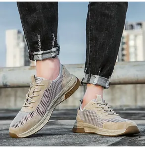 Detailed view of khaki leather mesh sneakers for men showing breathable texture and grip