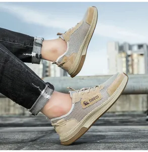 Detail of men's breathable mesh leather sneakers with anti-slip rubber soles outdoors