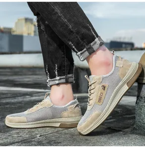 Detail of breathable mesh upper and leather panels on men's outdoor casual sneakers