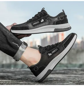 Close-up of breathable mesh panel and premium leather upper on men's casual sneakers