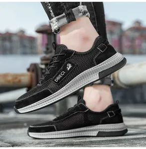 Detail view of breathable black mesh and suede outdoor casual sneakers with anti-slip sole