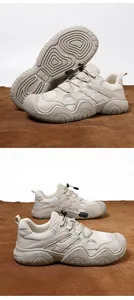 Detailansicht der khakifarbenen Leder-Wanderschuhe mit rutschfester dicker Gummisohle