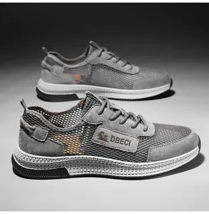 Detail of gray mesh outdoor casual shoes with breathable fabric and suede leather paneling