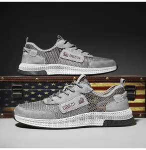 Detail of grey leather mesh sneakers featuring a thick anti-slip sole and side logo