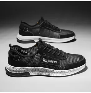 Detail view of breathable mesh and genuine leather upper with DBECI logo on black sneakers