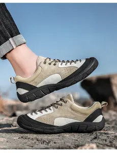 Close-up of khaki suede hiking shoes with breathable mesh and anti-slip rubber outsoles