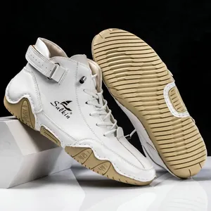 Weiße High-Top Sneaker mit Klettverschluss am Knöchel und rutschfester Gummisohle in Braun