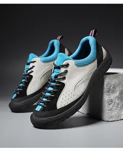 Close-up of suede hiking shoes with breathable mesh and durable rubber sole