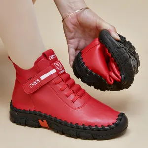 Flexible red leather high-top boots for women with soft rubber soles and velcro straps