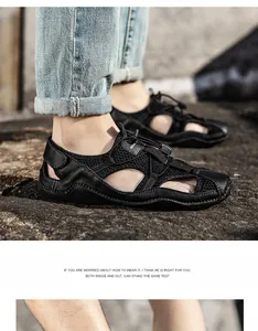 Detail of men's black outdoor sandals featuring breathable mesh and drawstring lacing system
