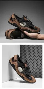 Close-up of brown leather and mesh outdoor sandals with toggle laces and rubber toe