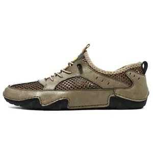 Detail of khaki leather and breathable mesh panels on men's outdoor casual sneakers