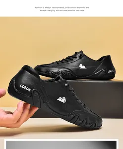 Detailopname van zwarte leren vrijetijdsschoenen voor heren met LDECK-logo en antislipzool