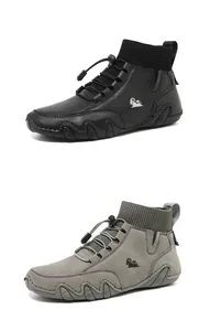 Details von High-Top-Freizeitschuhen in Schwarz und Grau mit elastischen Schnürsenkeln