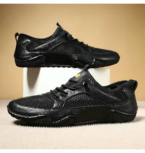 Detail view of men's leather and mesh athletic sneakers with octopus grip rubber soles