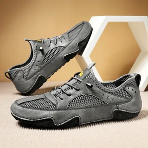Breathable dark gray leather and mesh men's casual sneakers with non-slip rubber soles