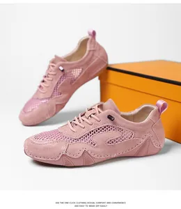 Detail of pink mesh outdoor sneakers with suede paneling and durable rubber soles