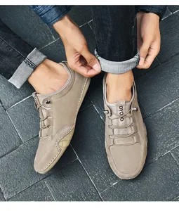 Detail of khaki genuine leather men's casual shoes with elastic laces and brand logo