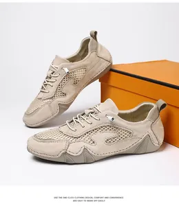 Detail view of beige mesh outdoor sneakers with drawstring laces and slip-resistant rubber soles