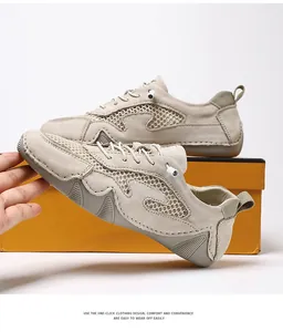 Detail view of khaki mesh upper and quick-lace system on breathable outdoor casual shoes