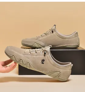 Detail of khaki genuine leather men's shoe featuring a unique wavy rubber sole design