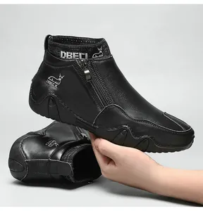 Vue détaillée de bottines en cuir pour hommes avec fermeture éclair latérale et col en maille