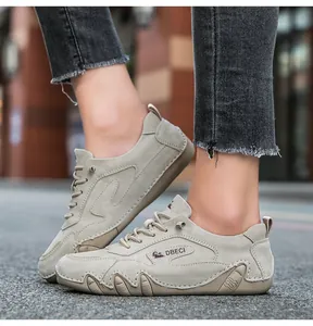 Detail of hand-stitched seams and anti-slip sole on men's leather outdoor leisure shoes