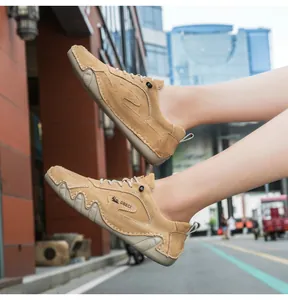 Outdoor street view of brown suede casual shoes for men with durable non-slip rubber soles