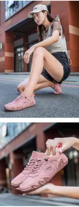 Detailed shot of pink mesh and suede hiking sneakers with breathable LDECK design