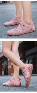 Detailed macro view of breathable pink mesh and suede panels on sports sneakers